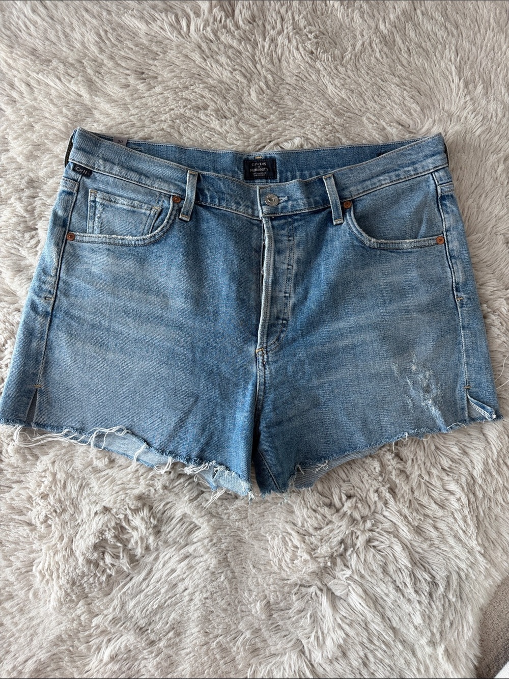 Citizens of Humanity Light Blue Denim Cutoff Shorts with Frayed Hem and Stretch